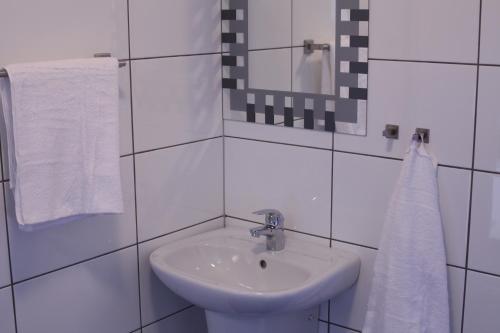 Um banheiro em Nacka Stadshotell