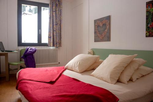 Postel nebo postele na pokoji v ubytování VTF Le Rafour