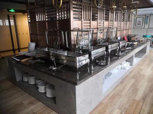 Cuisine ou kitchenette dans l'établissement Metropolo Jinjiang Wuhan Optics Valley Science and Technology Exhibition Center