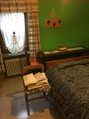 Postel nebo postele na pokoji v ubytování Agritur Alpino