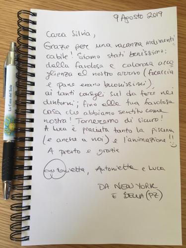 a letter i wrote in a notebook with a pen at La Casa del Sole in Marina di Pisticci