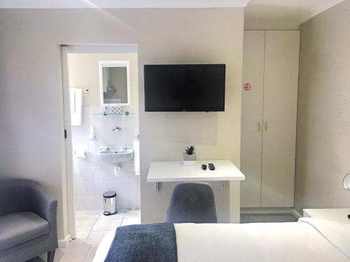 Μια τηλεόραση ή/και κέντρο ψυχαγωγίας στο Selton Guesthouse