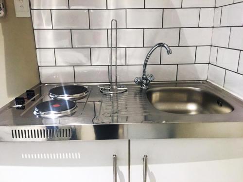 Η κουζίνα ή μικρή κουζίνα στο Selton Guesthouse