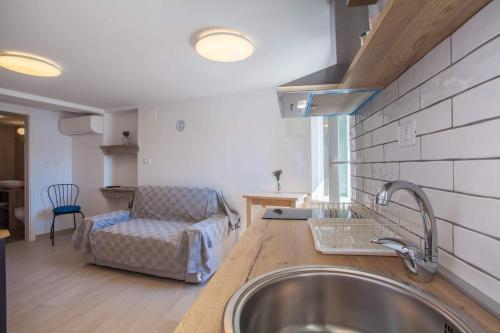 Kuchyň nebo kuchyňský kout v ubytování Apartmani Kraj mora