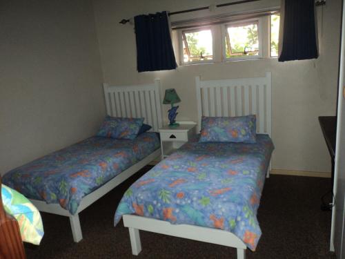 Ένα ή περισσότερα κρεβάτια σε δωμάτιο στο Thornbay accommodation