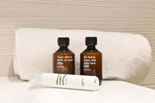 two bottles of soap and a roll of toilet paper at Acta Voraport in Barcelona