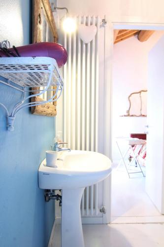 a bathroom with a white sink in a room at B&B Cittabella in Cittadella
