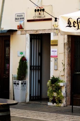 an entrance to a building with a black door at B&B Cittabella in Cittadella