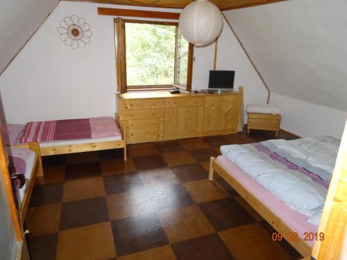 Postel nebo postele na pokoji v ubytování Chata Kamberk