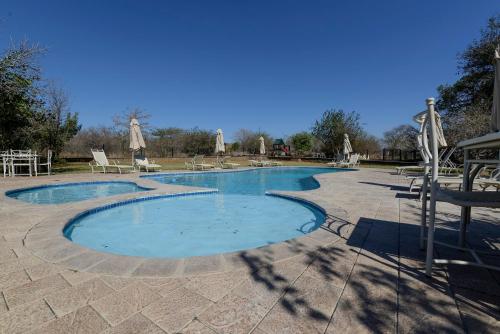Πισίνα στο ή κοντά στο Sweni Lodge 91 Mjejane Kruger Park