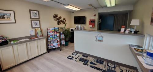 a store with a counter in a room at The Dunes Rehoboth Beach in Dewey Beach