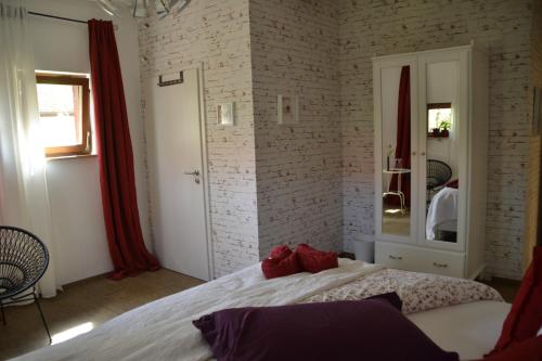 Ένα ή περισσότερα κρεβάτια σε δωμάτιο στο Romantisches Bed&Breakfast Apfelstern