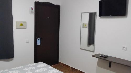 Giường trong phòng chung tại HOSTAL Almagro - Parking