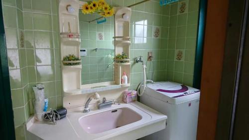 Un baño de 日本冲绳那霸市白银公寓