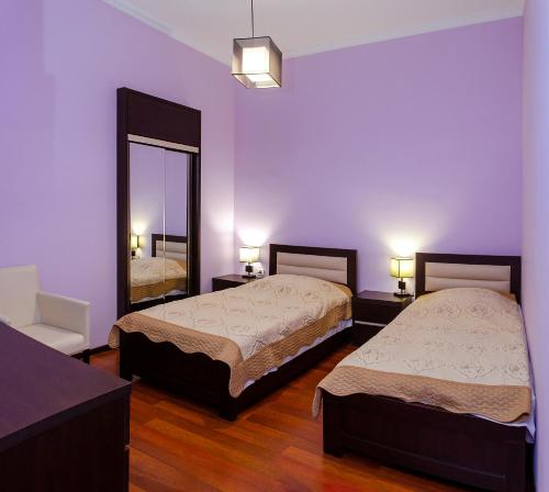 A bed or beds in a room at Apartment Amaghleba