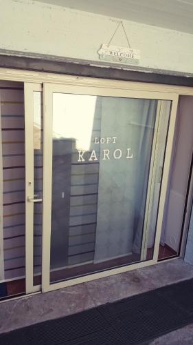 a shop window with the words notajiroid on it at Loft Karol Taormina in Gaggi
