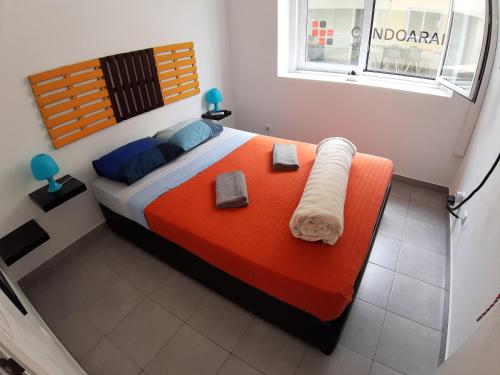 Posteľ alebo postele v izbe v ubytovaní Alameda Hostel