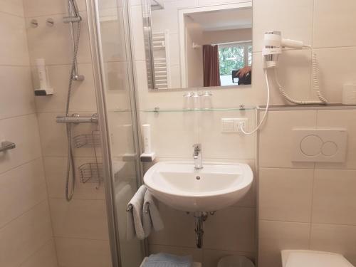 Koupelna v ubytování Comfort Rooms Bruckner