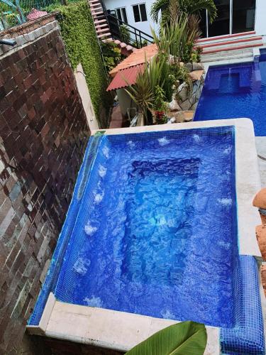 La alberca dentro o cerca de Hotel Terrazas Inn