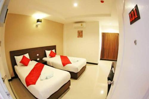 Ένα ή περισσότερα κρεβάτια σε δωμάτιο στο BK Place Hotel