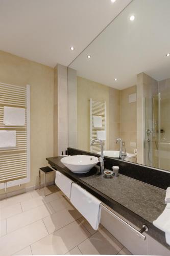 Koupelna v ubytování Aqua Aurelia Suitenhotel an den Thermen