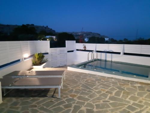 a swimming pool on the roof of a house at A Sea of Stars in Pefki Rhodes