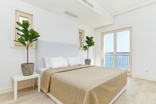 Katil atau katil-katil dalam bilik di Apartment G621 - Lustica Bay
