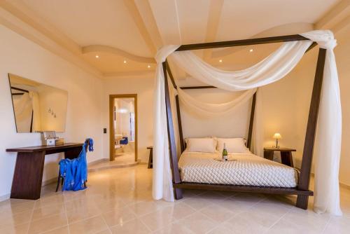 Ένα ή περισσότερα κρεβάτια σε δωμάτιο στο Lucia's Secret Garden