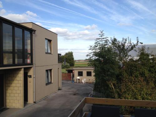 a view from the balcony of a house at Hostellerie Daiseldaele in Dadizele