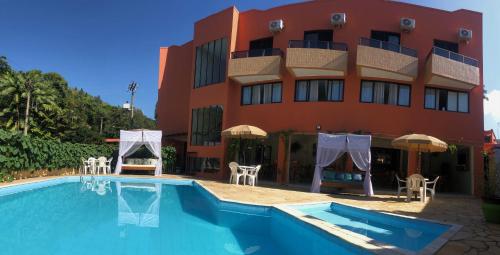 A piscina localizada em Hotel Ponta das Toninhas ou nos arredores