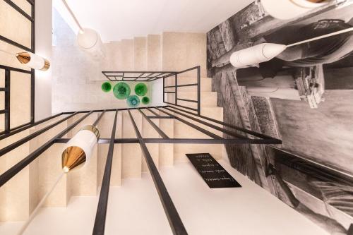 a room with a ping pong table with green balls at Filinona B&B in Noto