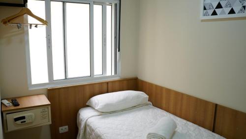 Katil atau katil-katil dalam bilik di Hotel Casa Ocarina - 850 metros São Paulo Expo