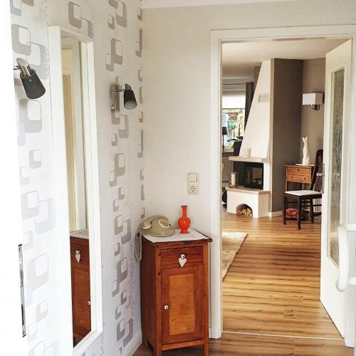a hallway of a home with a room with white walls at Haus Tina in Mölln