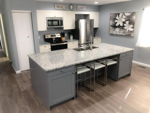 a kitchen with a sink and a counter top at Liberty House in Bethany