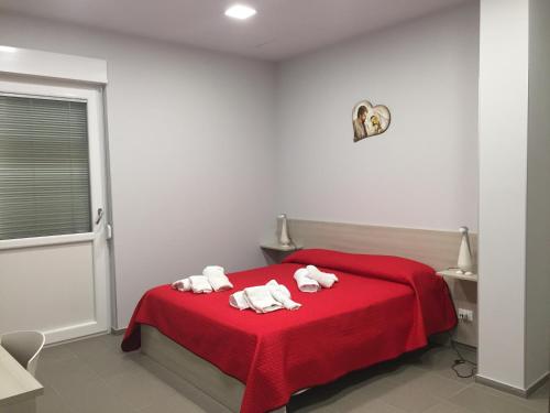 A bed or beds in a room at B&B San Francesco di Paola