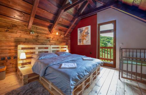 Postel nebo postele na pokoji v ubytování Holiday home Romana