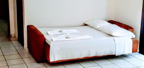 Hotel Jangada Flatにあるベッド