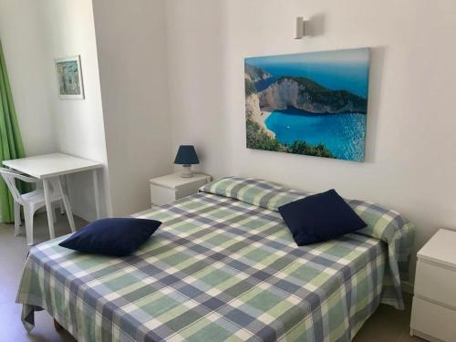 Ένα ή περισσότερα κρεβάτια σε δωμάτιο στο Blu d'Eraclea