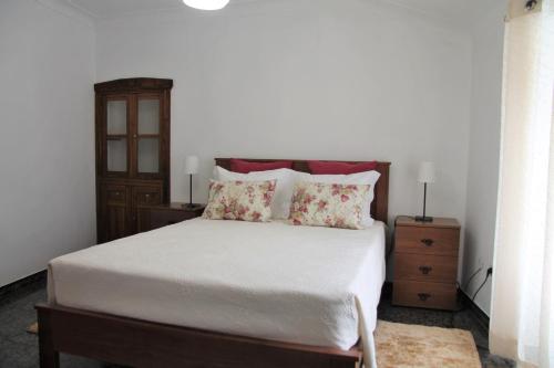 Un pat sau paturi într-o cameră la Casa São João