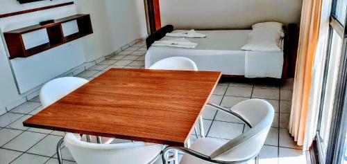 Hotel Jangada Flatにあるベッド