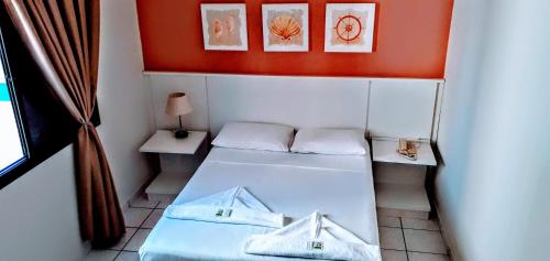 Hotel Jangada Flatにあるベッド
