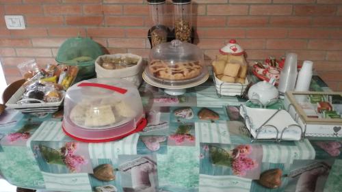a table with a table cloth with food on it at B&B Pozzo Innamorato in Montenero di Bisaccia