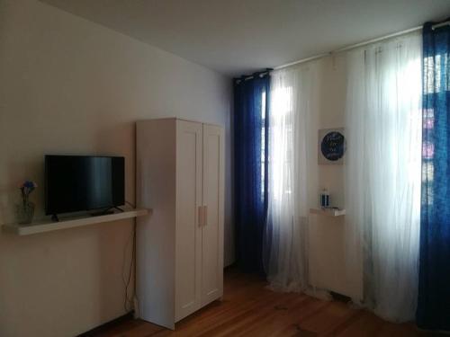 Μια τηλεόραση ή/και κέντρο ψυχαγωγίας στο Oportobestview-Sun