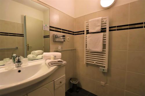 Kylpyhuone majoituspaikassa Hotel Des Tuileries