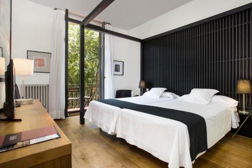 Llit o llits en una habitació de Hotel Market