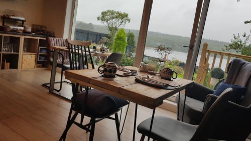 A restaurant or other place to eat at Airanloch Bed & Breakfast, Loch Ness, Adult Only