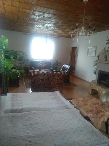 a living room with a couch and a table at Privát u Ivana in Štrba