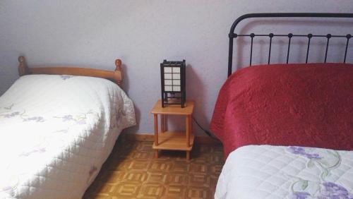 Katil atau katil-katil dalam bilik di CHAMBRES D'HÔTES DE MALVALETTE