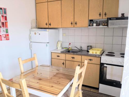 Η κουζίνα ή μικρή κουζίνα στο Traditional penthouse with mountain view