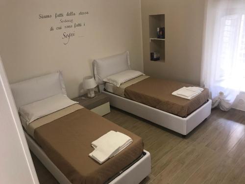 En eller flere senge i et værelse på B&B San Giovanni